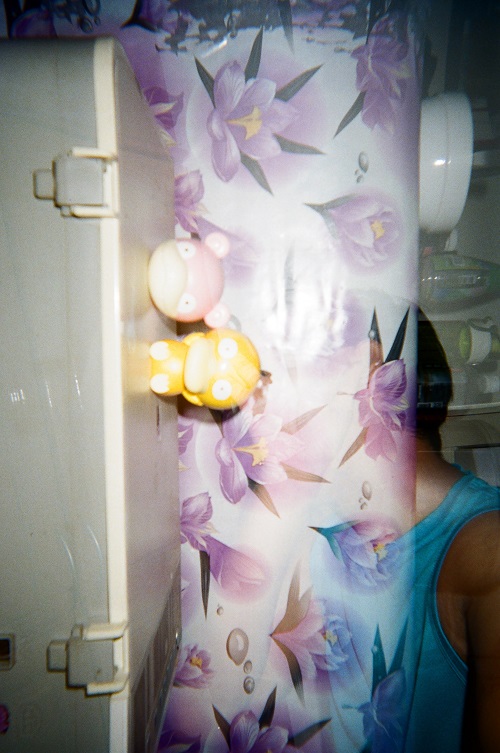 Double exposed shot on a FunSaver featuring me, psyduck and slowpoke